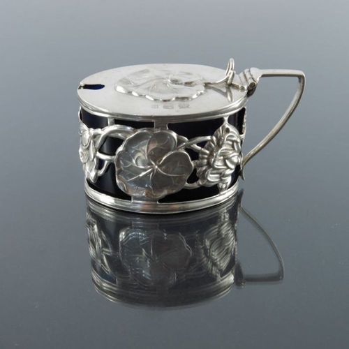 261 - An Arts and Crafts silver mustard pot, Alexander Clark Manufacturing Co, Birmingham 1902, oval secti... 