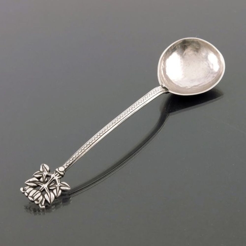 265 - Edward Spencer for the Artificers Guild, an Arts and Crafts white metal spoon, circa 1915, the deep ... 