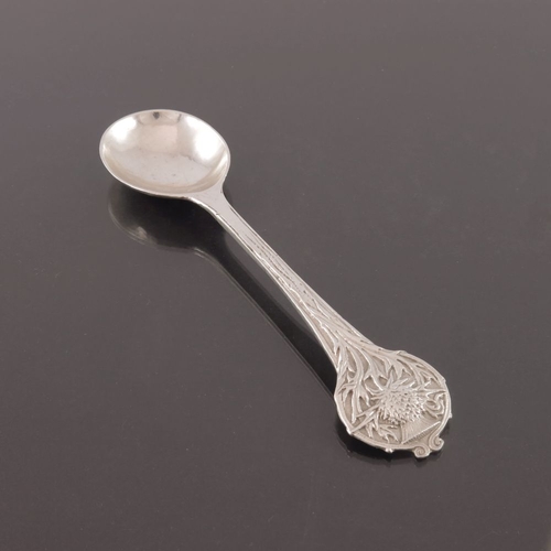 272 - Alwyn Carr, an Arts and Crafts silver spoon, London 1920, planished and cast with a thistle terminal... 