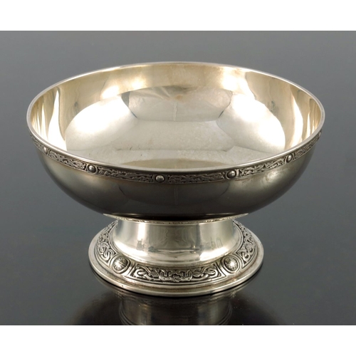 282 - An Arts and Crafts Iona style silver pedestal bowl, W Batty and Sons, London 1938, squat rounded for... 