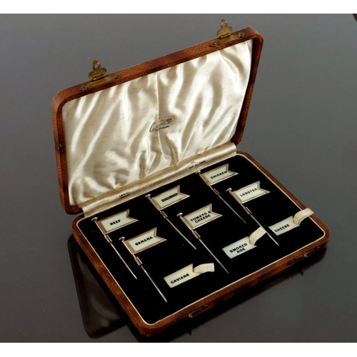 289 - A cased set of Art Deco silver sandwich markers, Adolph Scott, Birmingham 1936, each in the form of ... 