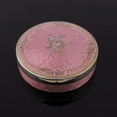 293 - A pink guilloche enamel circular powder compact together with an Art Deco guilloche pink enamel powd... 