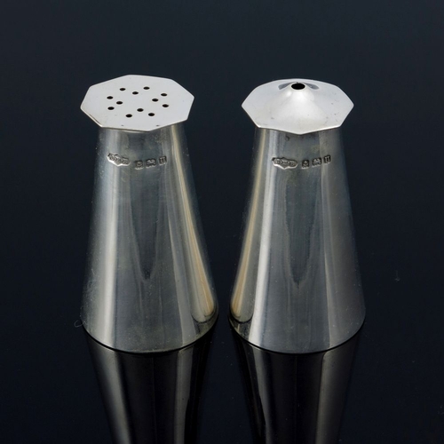 295 - A pair of Modernist silver salt and pepper pots, J E Bushell, Birmingham 1944, conical form with oct... 