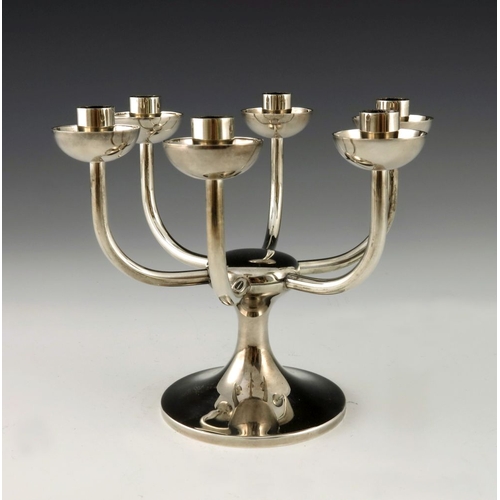 299 - Robert Welch, a Modernist silver six branch candelabrum, London 1984, the capstan type splayed foot ... 