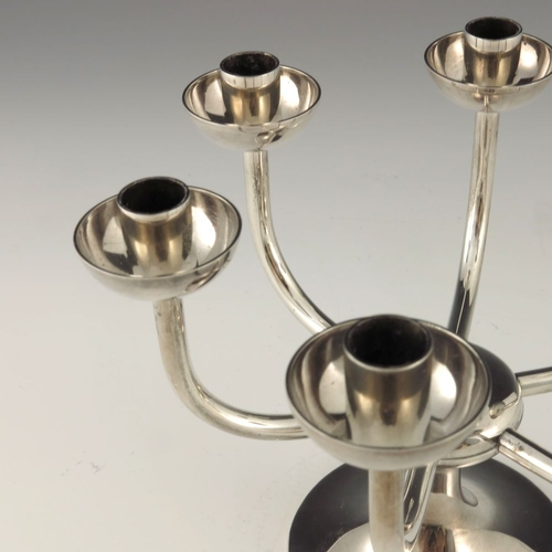 299 - Robert Welch, a Modernist silver six branch candelabrum, London 1984, the capstan type splayed foot ... 