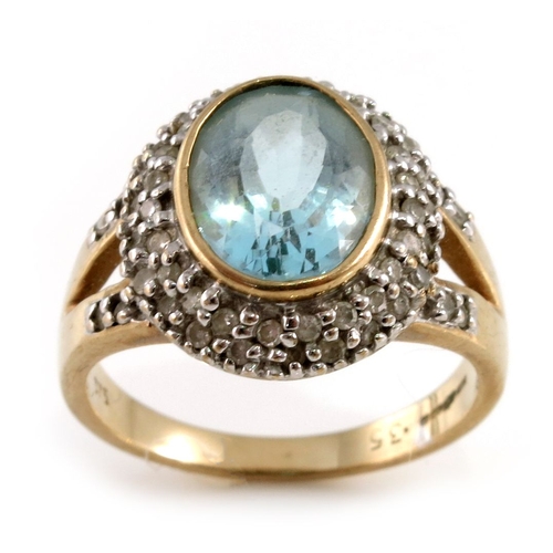 308 - A 9ct gold oval-shape aquamarine and single-cut diamond cluster dress ring, with openwork shoulders,... 