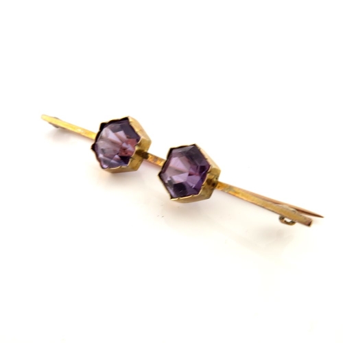 315 - Three gold gem-set brooches, to include a split pearl harp brooch, an amethyst two-stone bar brooch ... 