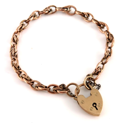 320 - A mid 20th century fancy-link bracelet, with heart-shape padlock clasp, hallmarks for Birmingham 195... 