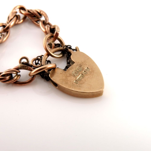 320 - A mid 20th century fancy-link bracelet, with heart-shape padlock clasp, hallmarks for Birmingham 195... 