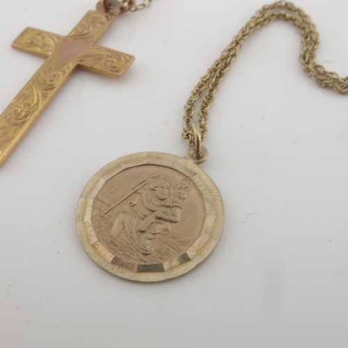 322 - Two 9ct gold religious pendants, each suspended from a chain, marks to indicate 9ct gold, lengths of... 