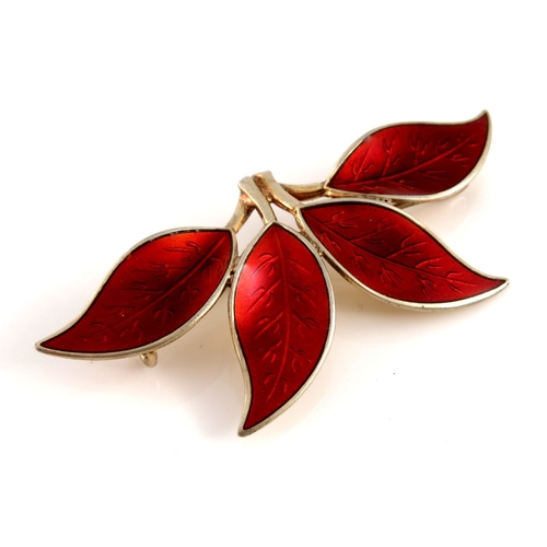 330 - Willy Winnaess for David Andersen, a Danish Modernist silver gilt and enamel four leaf brooch, circa... 