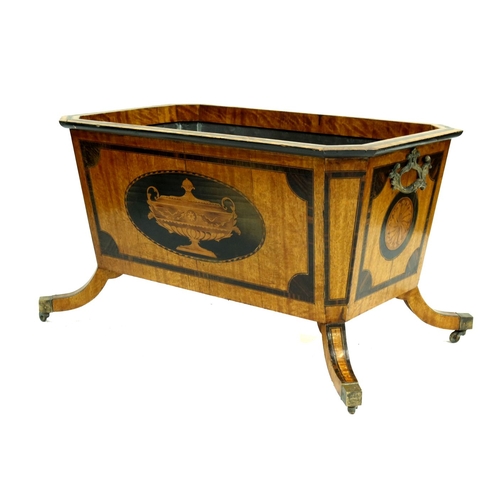 346 - A Regency design mahogany wine cooler, of sarcophagus form with cast metal scroll side handles, cros... 