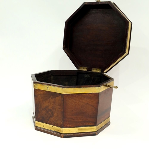 351 - A George III mahogany cellarette, circa 1780, of octagonal brass bound form, side brass carrying han... 