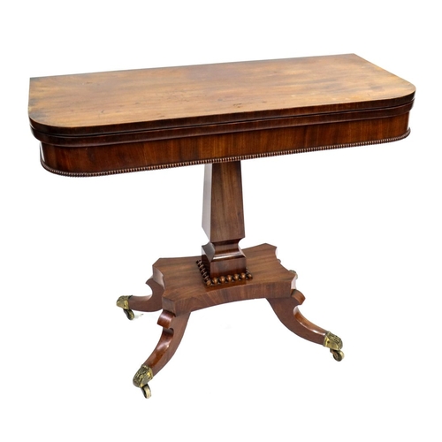 357 - A Regency mahogany tea table, circa 1820, fold-out top, gadroon border, square section baluster supp... 