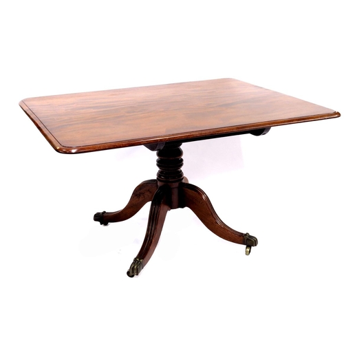 359 - A Regency mahogany breakfast table, circa 1820, rectangular moulded tilt-top, baluster pedestal, ree... 