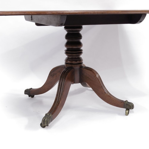 359 - A Regency mahogany breakfast table, circa 1820, rectangular moulded tilt-top, baluster pedestal, ree... 