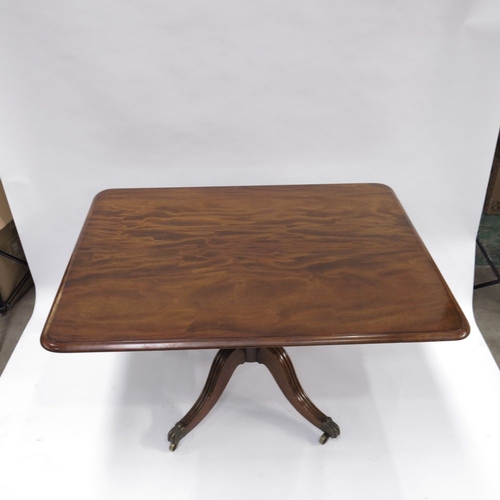 359 - A Regency mahogany breakfast table, circa 1820, rectangular moulded tilt-top, baluster pedestal, ree... 