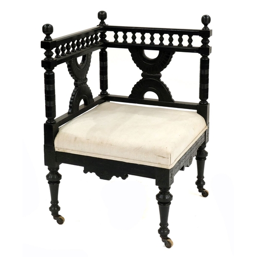 361 - An Aesthetic Movement ebonised corner chair, in the style of Christopher Dresser, circa 1880, Mooris... 