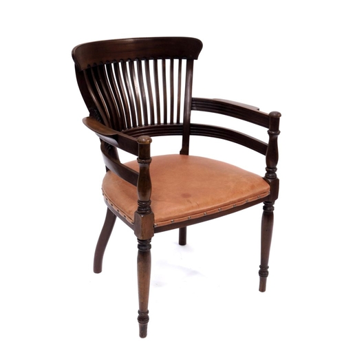 370 - E W Godwin for James Peddle, an Aesthetic Movement walnut armchair, circa 1881, the shaped back with... 