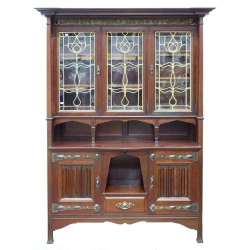 372 - Shapland and Petter, Barnstaple, an Arts and Crafts mahogany and copper bookcase cabinet, circa 1905... 