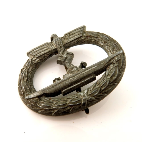 411 - Two World War Two German Kriegsmarine U-Boat War Badges, unmarked with vertical pin and catch fixing... 