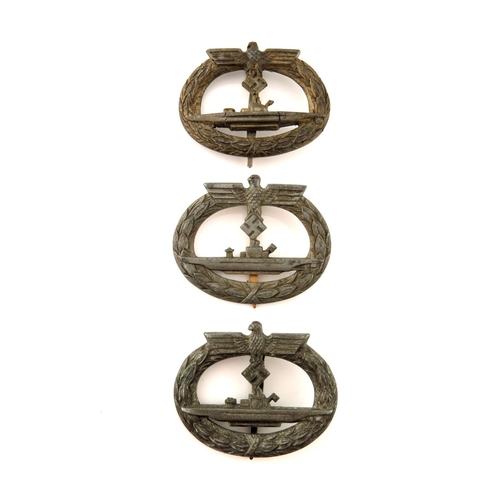 413 - Three World War Two German Kriegsmarine U-Boat War Badges, all unmarked, one with vertical pin and c... 