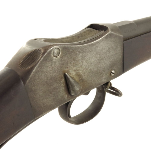 423 - A Martini-Henry style sporting rifle retailed by George Gibbs, 32 inch blued barrel, barrel engraved... 