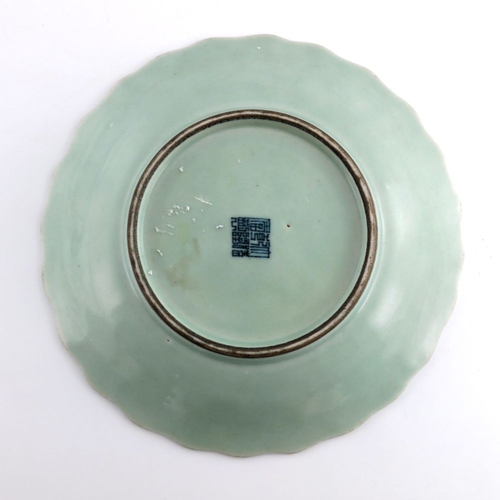 432 - A 19th Century Chinese celadon glaze plate, wavy rim, underglaze petal design, blue Qianlong seal ma... 