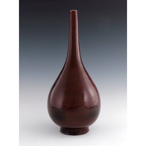 437 - A 19th Century Chinese sang de boeuf glaze bottle vase, extended neck, height 42cm