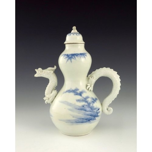 455 - A Japanese Hirado porcelain teapot, Meiji period, 1868-1912, the spout moulded in the form of a drag... 