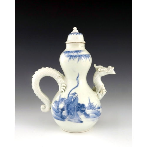 455 - A Japanese Hirado porcelain teapot, Meiji period, 1868-1912, the spout moulded in the form of a drag... 