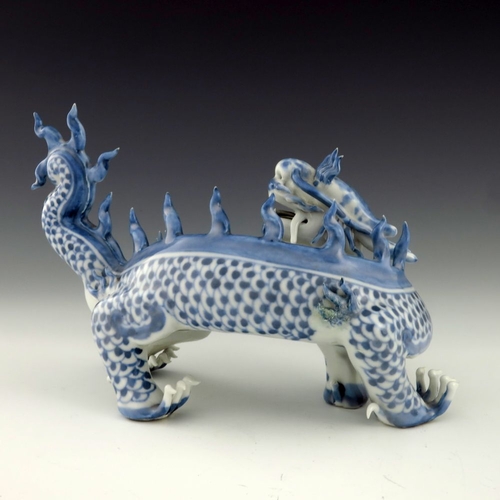 456 - A Japanese Hirado porcelain figure of a dragon, Meiji period, 1868-1912, blue scales, four claws, mo... 