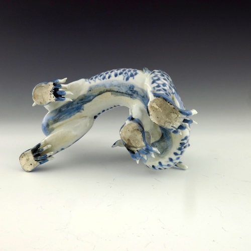 456 - A Japanese Hirado porcelain figure of a dragon, Meiji period, 1868-1912, blue scales, four claws, mo... 