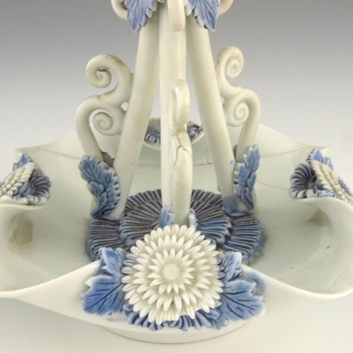 459 - A pair of Japanese Hirado porcelain candlesticks, Meiji period, 1868-1912, in the form of chrysanthe... 