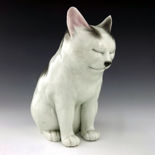 464 - A Japanese Hirado porcelain model of a seated cat, 20th Century, impressed Japan mark, height 24cm