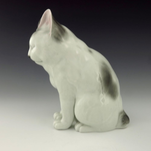 464 - A Japanese Hirado porcelain model of a seated cat, 20th Century, impressed Japan mark, height 24cm