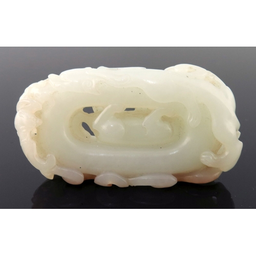 470 - A Chinese pale jade carving, reticulated with a dog, scroll border, width 6cm