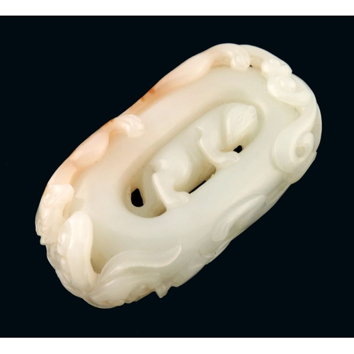 470 - A Chinese pale jade carving, reticulated with a dog, scroll border, width 6cm