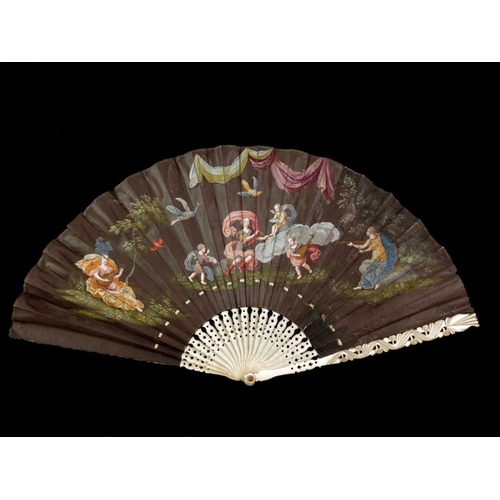 523 - λ A circa 1660-1670 European fan of ivory and vellum painted with various musicians in a landscape, ... 