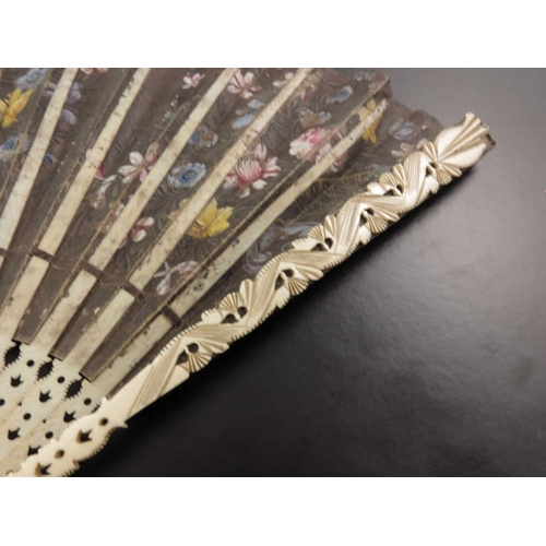 523 - λ A circa 1660-1670 European fan of ivory and vellum painted with various musicians in a landscape, ... 