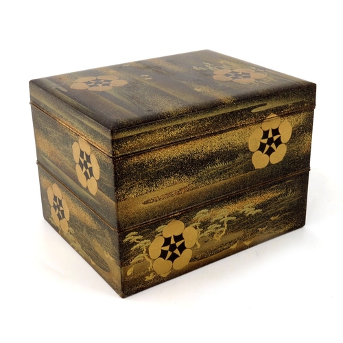 525 - A 19th century Japanese maki-e lacquer three tier box, meiji, cuboid form, with two graduated stacki... 