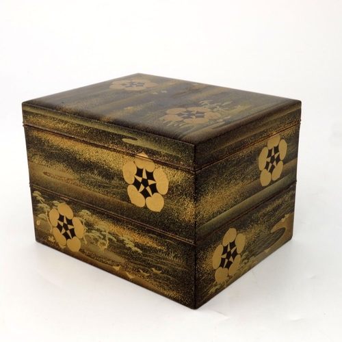 525 - A 19th century Japanese maki-e lacquer three tier box, meiji, cuboid form, with two graduated stacki... 