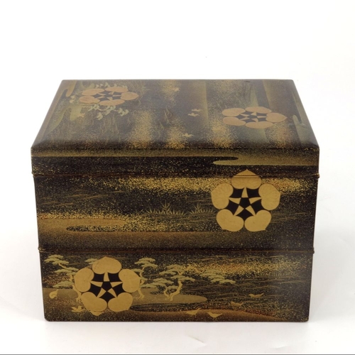 525 - A 19th century Japanese maki-e lacquer three tier box, meiji, cuboid form, with two graduated stacki... 