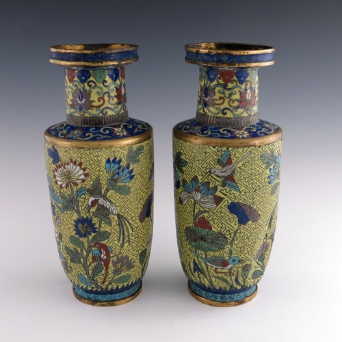 532 - A pair of Chinese cloisonne vases, late 19th Century, of baluster form with gilt metal rims, decorat... 