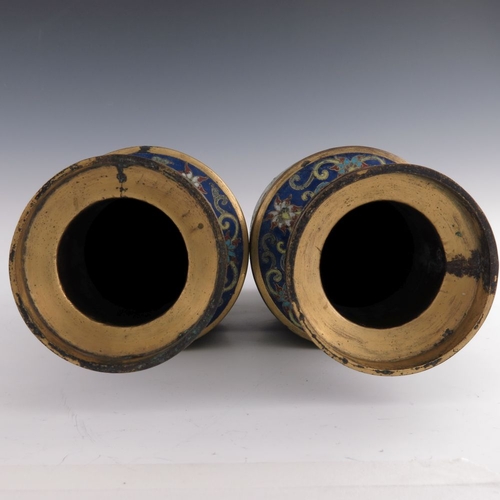 532 - A pair of Chinese cloisonne vases, late 19th Century, of baluster form with gilt metal rims, decorat... 