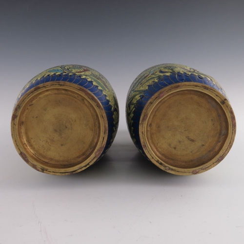 532 - A pair of Chinese cloisonne vases, late 19th Century, of baluster form with gilt metal rims, decorat... 