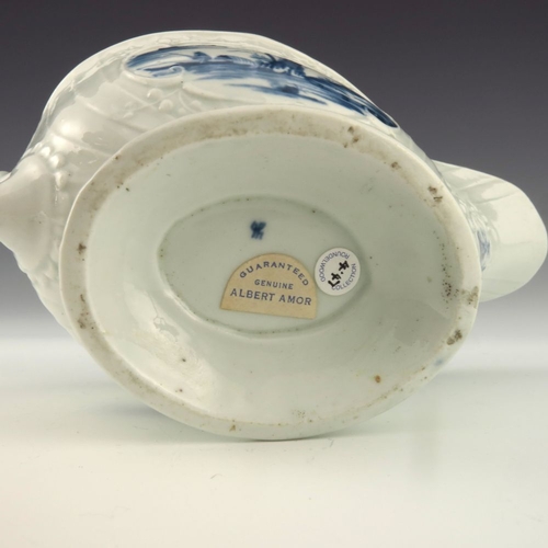 1176 - A Worcester blue and white relief moulded sauce boat, circa 1760, workman's mark, painted with the F... 