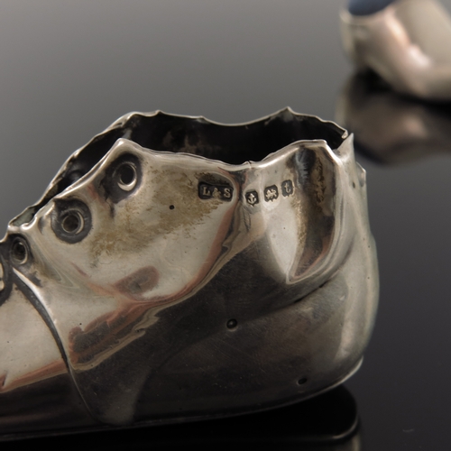 175 - An Edwardian novelty silver pin cushion, Levi and Salaman, Birmingham 1906, modelled as a clog, toge... 