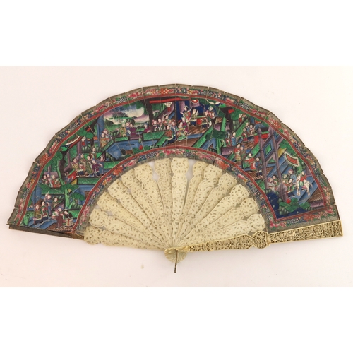 521 - A mid 19th Century Chinese fan, open fretwork and blind carved ivory sticks, the paper fan painted w... 