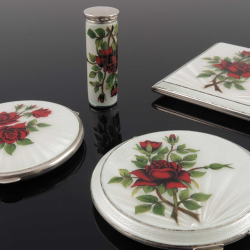 116 - An Elizabeth II silver and enamelled vanity set, Walker and Hall, Birmingham 1961, cream guilloche e... 